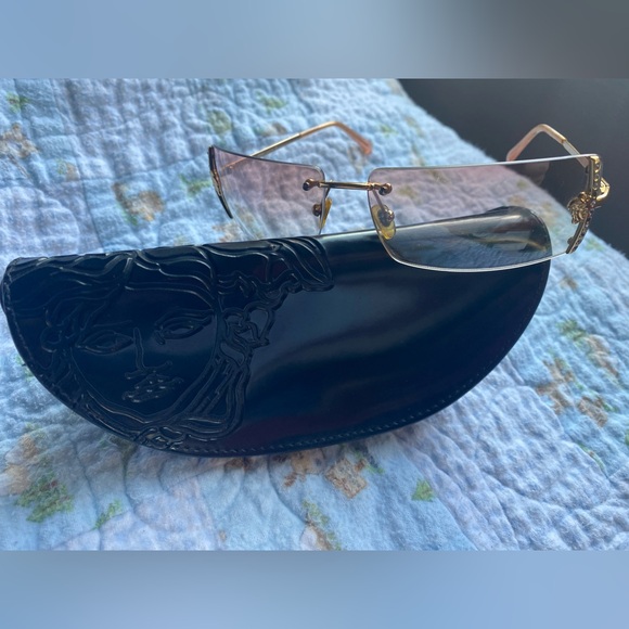 Versace Accessories - Versace Sunglasses. Vintage. Pink ish hue lenses. Well loved.